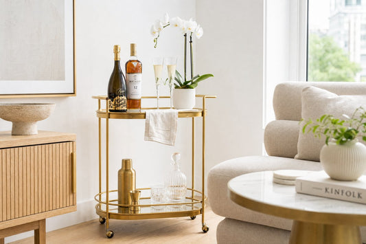 Bar cart for small spaces and apartments — compact gold oval bar cart styled in a bright modern Australian apartment with city views