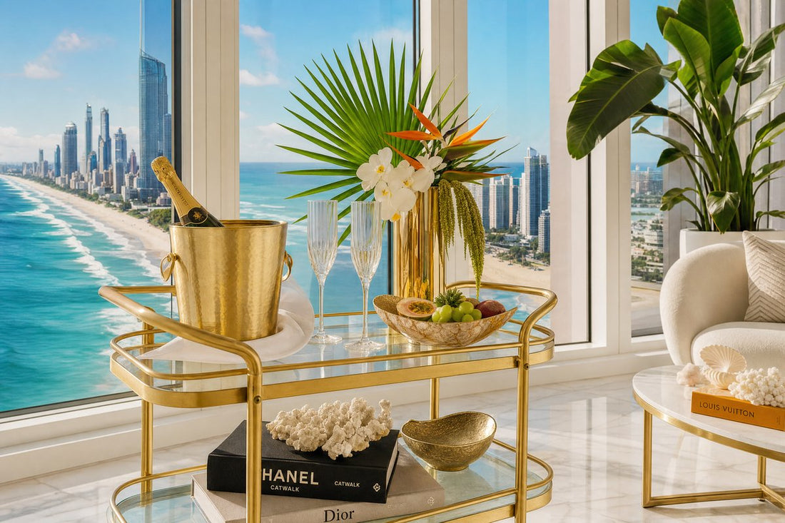 Drinks trolley Gold Coast — luxury gold bar cart in a high-rise apartment with Surfers Paradise skyline and beach view