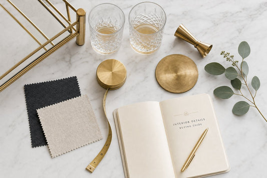 How to choose a bar cart — gold bar cart styled in a bright Australian living room with champagne and whisky, buying guide hero image