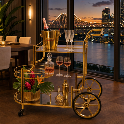 The Chateau gold bar cart in living room — luxury drinks trolley Australia