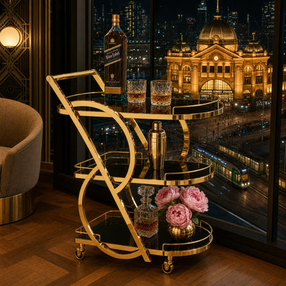 Teneriffe three-tier gold bar cart in Melbourne luxury apartment — gold serving cart with black glass shelves