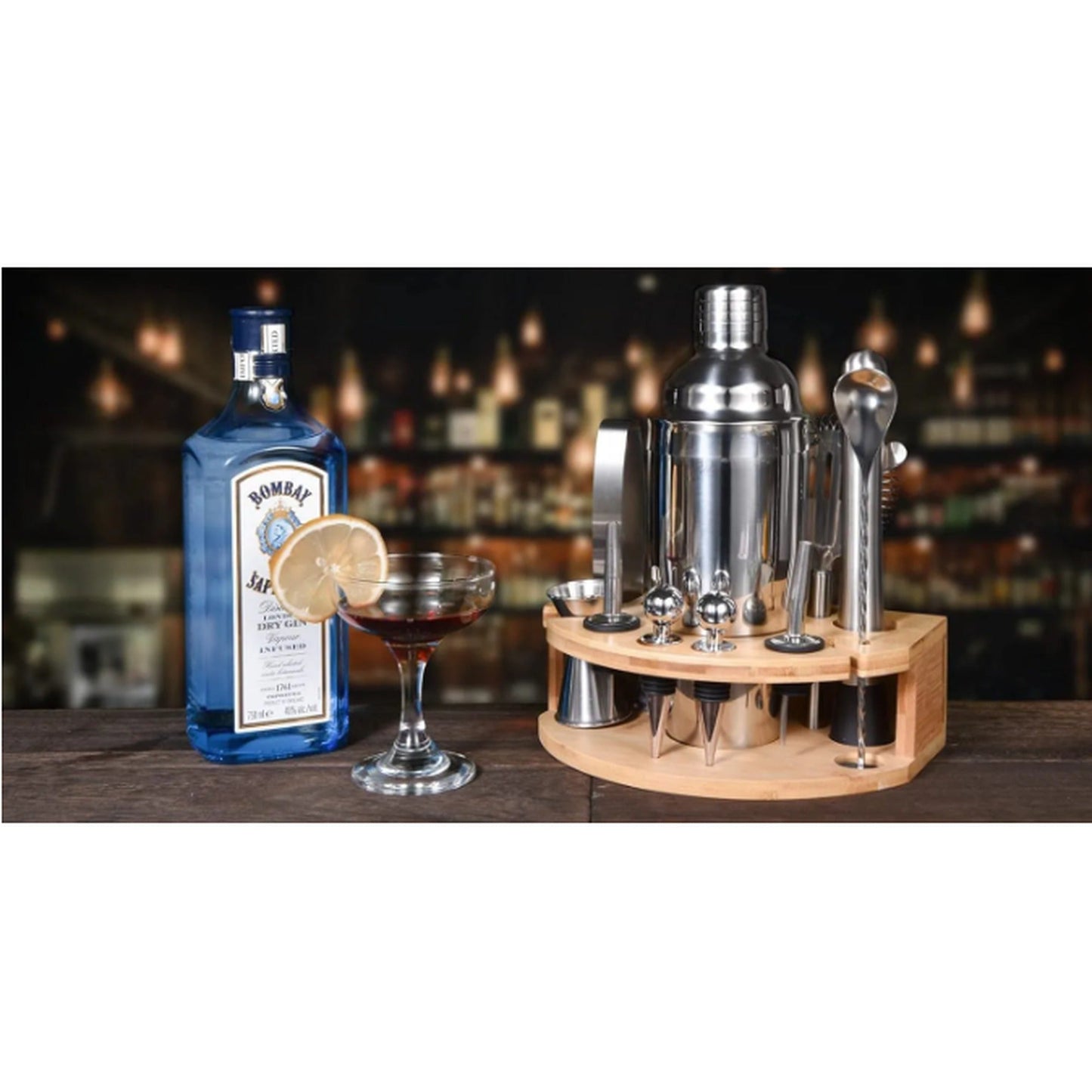 The Mixologist bartender kit styled in a moody home bar scene