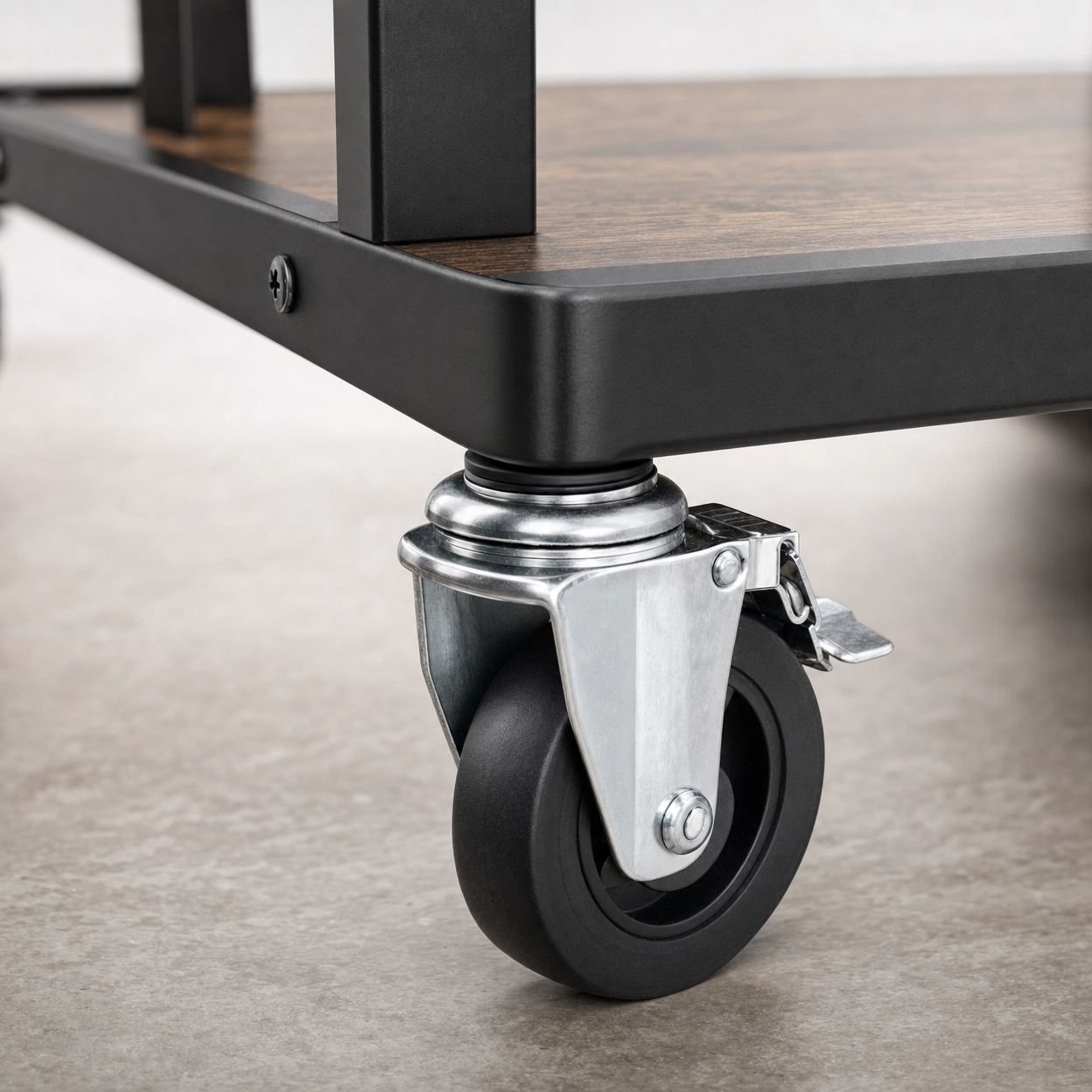 Close-up of Oslo wine cart smooth-rolling wheel with locking caster — three-tier industrial bar cart