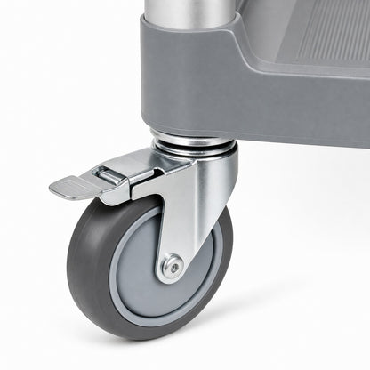 Close-up of commercial utility cart silent rubber caster wheel with locking brake — heavy-duty service trolley