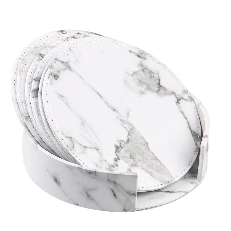 Round leather placemat set of 6 in white marble pattern with matching storage caddy