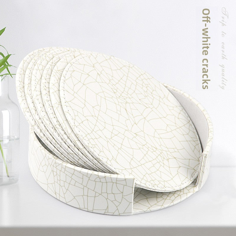 Round leather placemat set of 6 in Beige Ice Crack pattern with matching storage caddy