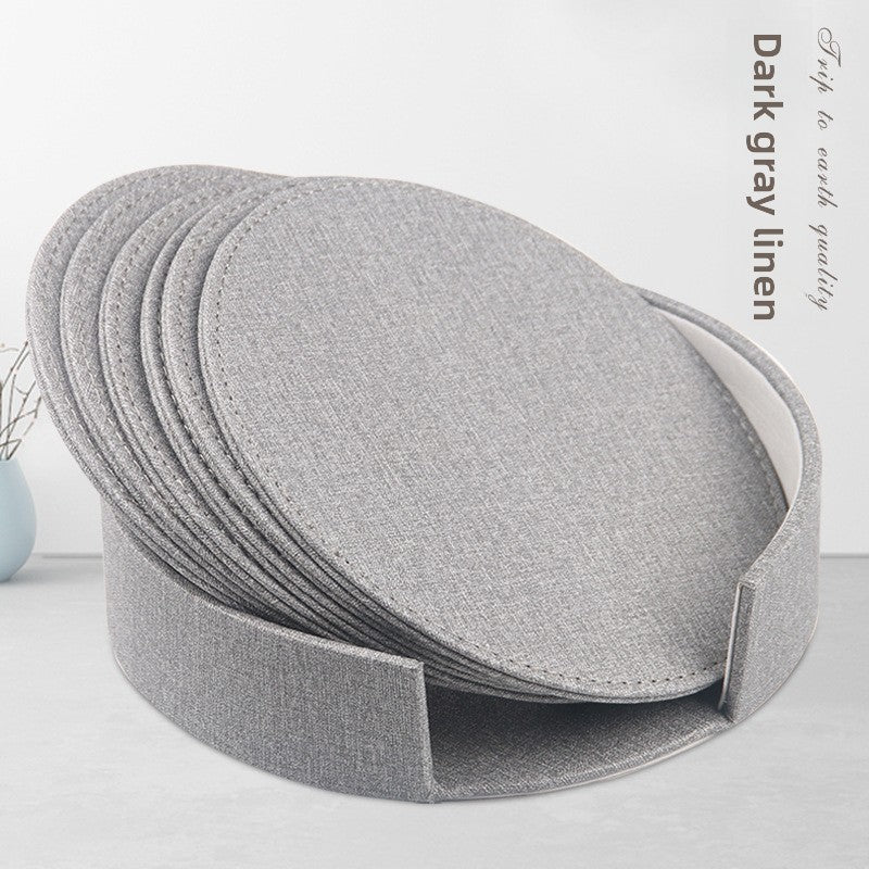 Round leather placemat set of 6 in Dark Grey Linen with matching storage caddy