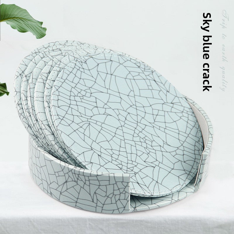 Round leather placemat set of 6 in Sky Blue Ice Crack pattern with matching storage caddy