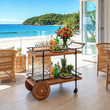 Fitzroy Wood and Iron Bar Cart on coastal beach balcony styled with tropical drinks and flowers — outdoor entertaining bar cart Australia