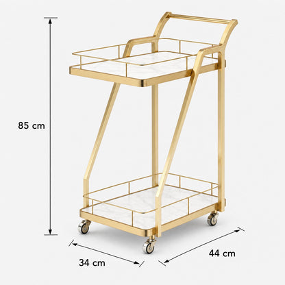 The Mosman Two-Tier Gold Marble-Look Service Cart featuring a striking Z-frame and white faux-marble shelves, styled with wine and glasses and day spas.