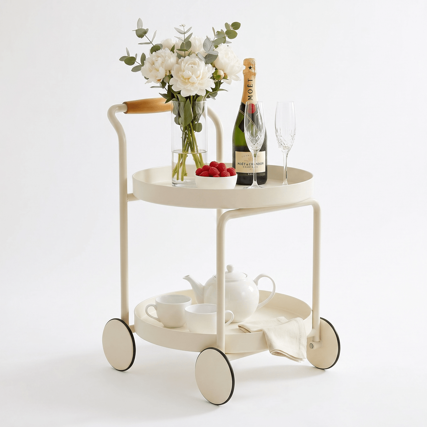 The Airlie round side cart top view — two-tier white bar cart