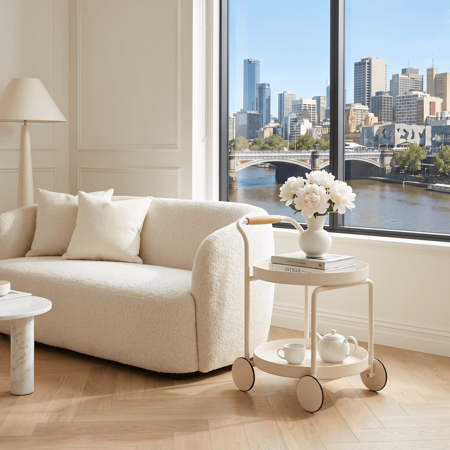 The Airlie side cart styled with tea set and flowers — round white trolley Australia