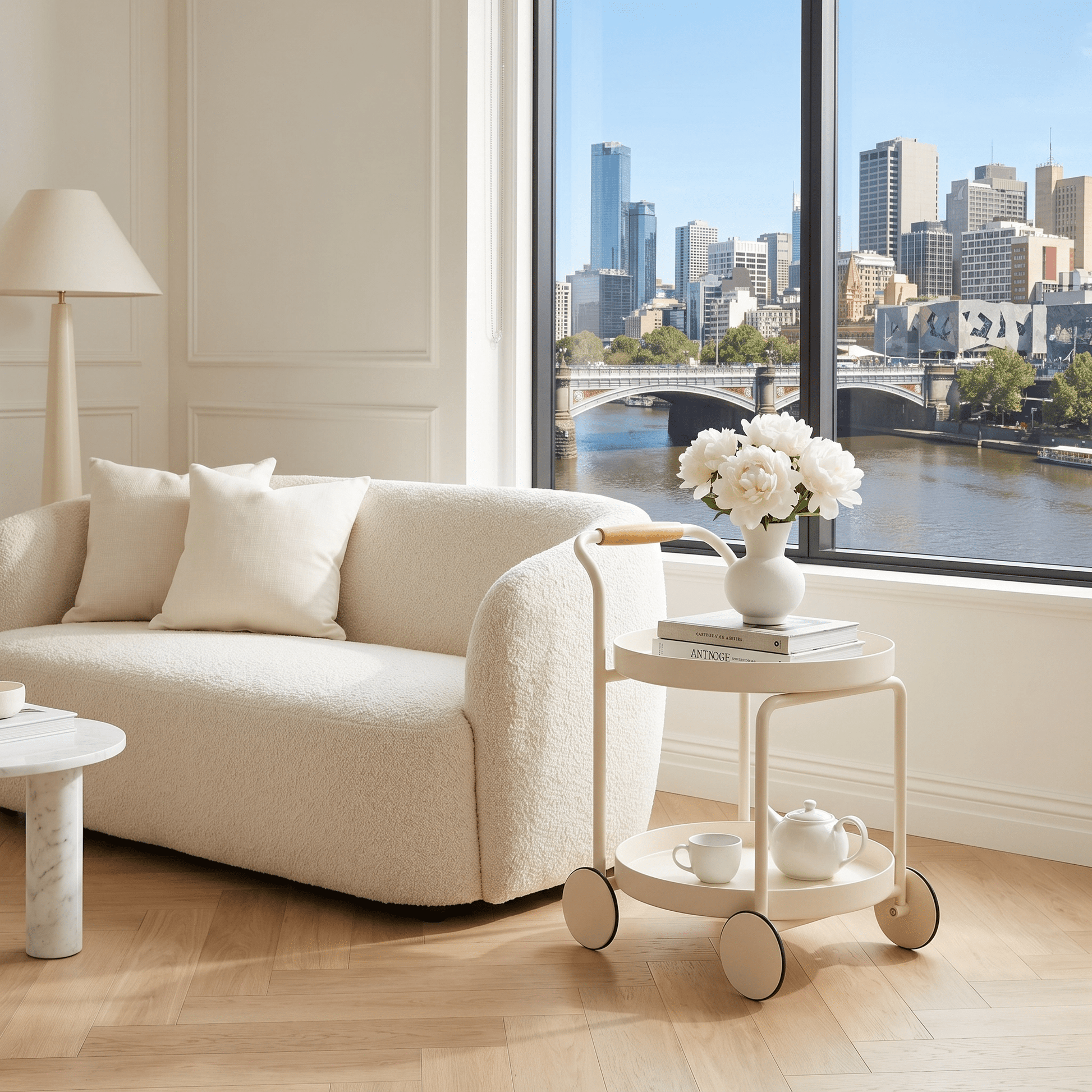 The Airlie side cart styled with tea set and flowers — round white trolley Australia