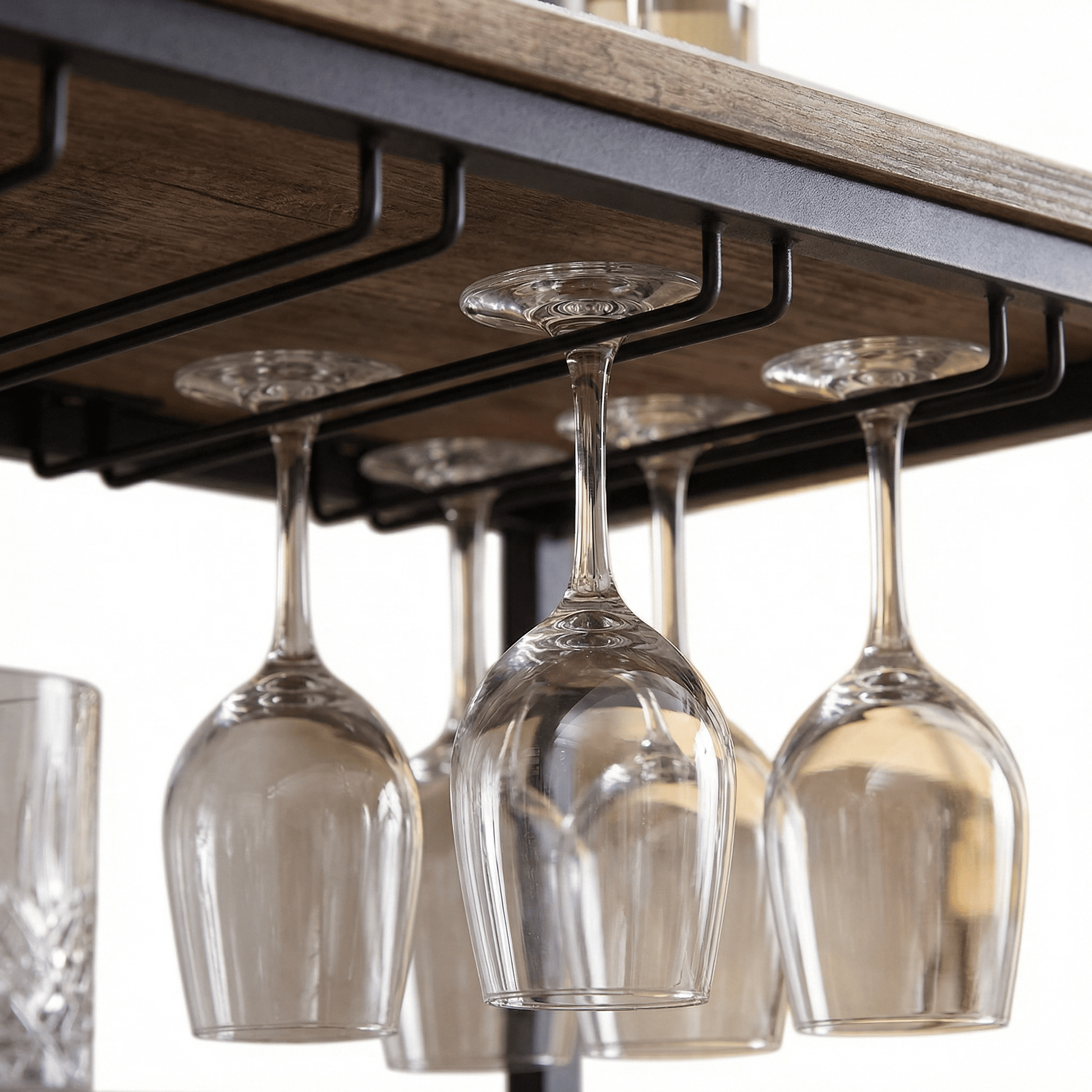 Close-up of the Barossa Nordic Iron Drinks Trolley’s sleek black frame and brown wooden shelves styled with glassware and bottles