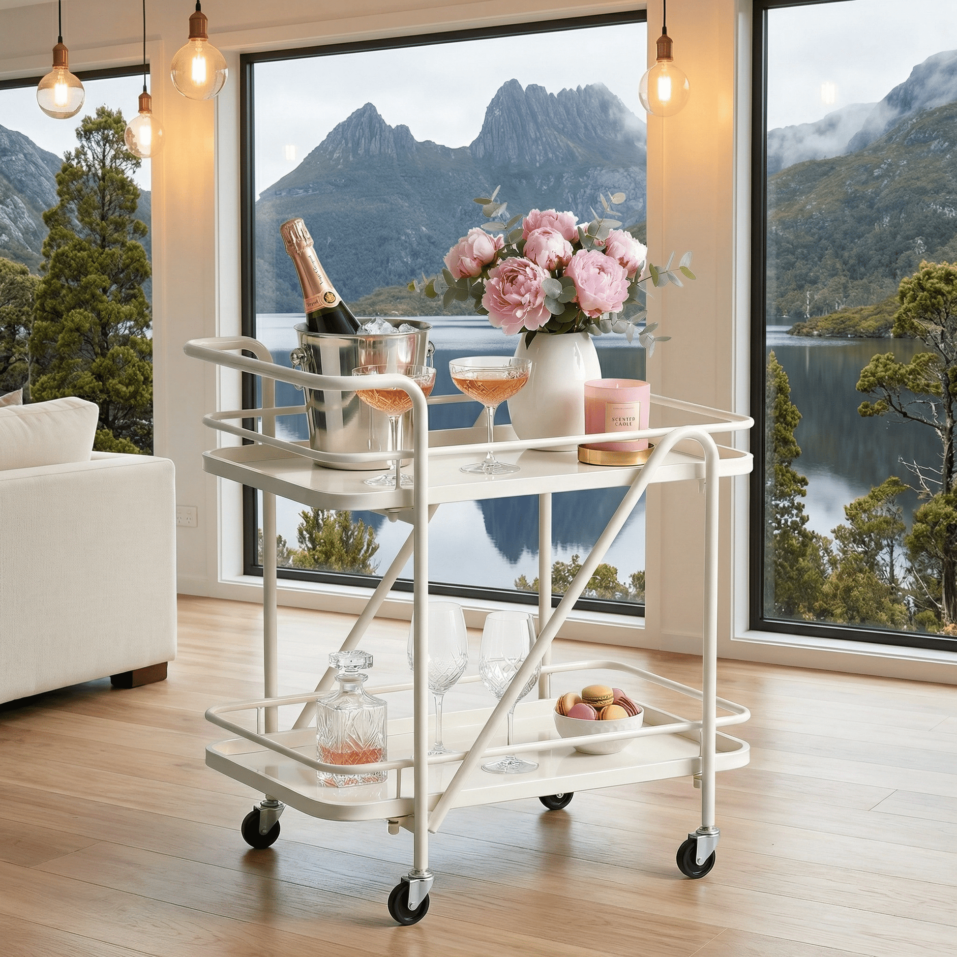 Close-up of The Brighton Two-Tier Metal Service Cart in black, styled with coastal deco accessories by Royal Bar Carts.