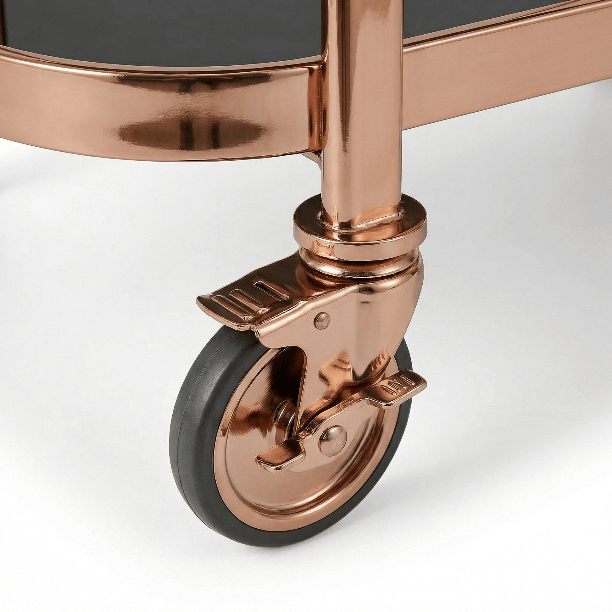 Close-up of the Collins Two-Tier Beverage Cart’s gold frame and glass shelves styled with elegant barware and deco accents.
