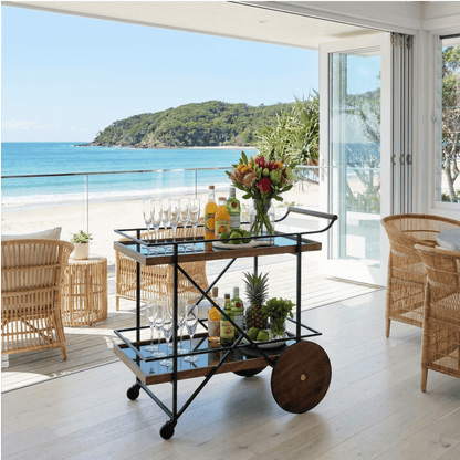 The Fitzroy Wood & Iron Bar Cart by Royal Bar Carts showcasing black iron frame and coastal deco styling details.
