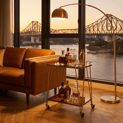 The Neutral Bay two-tier glass bar cart — gold frame with glass shelves, bar trolley Australia