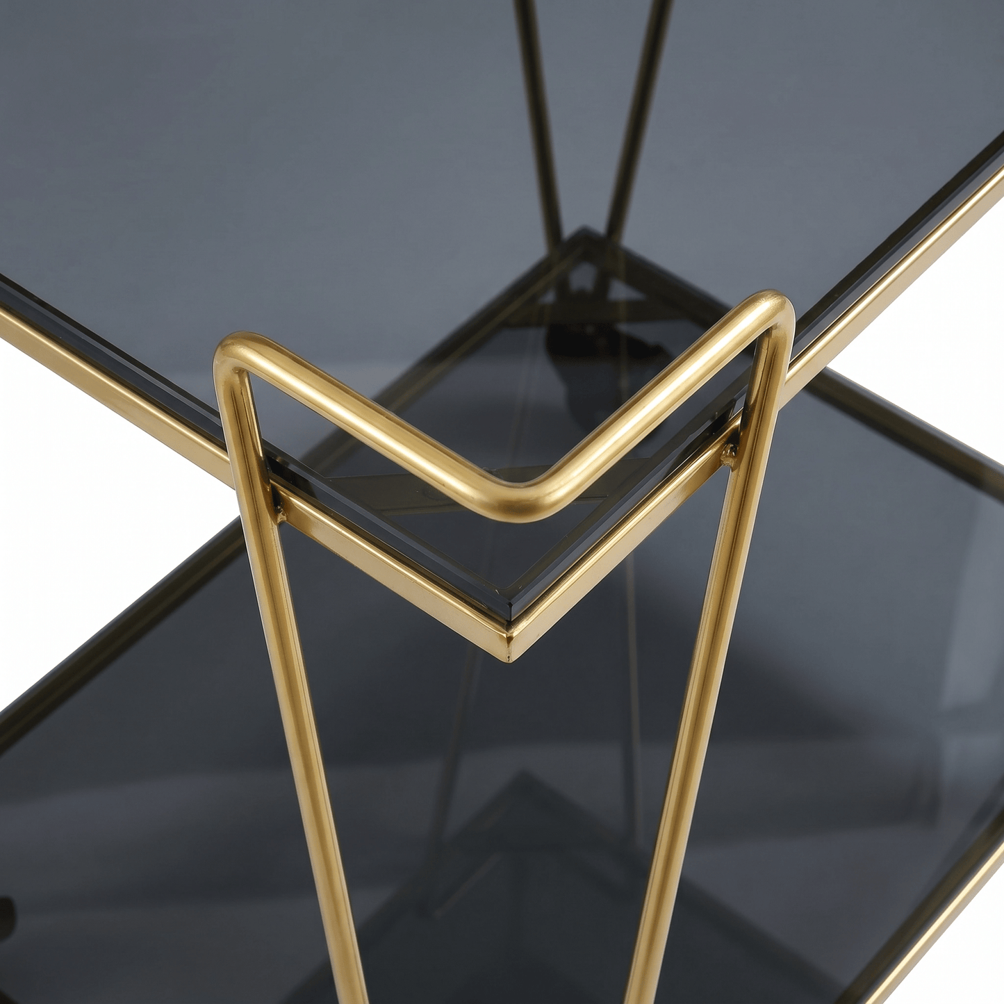 Close-up of The Neutral Bay Two-Tier Glass Bar Cart by Royal Bar Carts showcasing sleek gold frame and stylish deco details