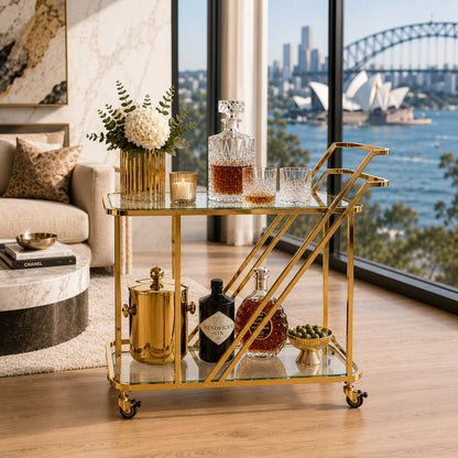 Monte Carlo art deco bar cart rear angle — curved dual push handles and geometric gold frame