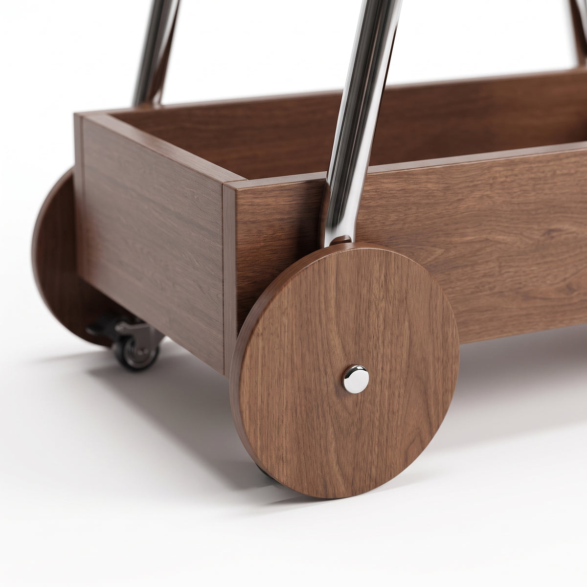 Close view of The Carlton's large solid walnut disc wheel with its polished hub, beneath the corner of the lower tray